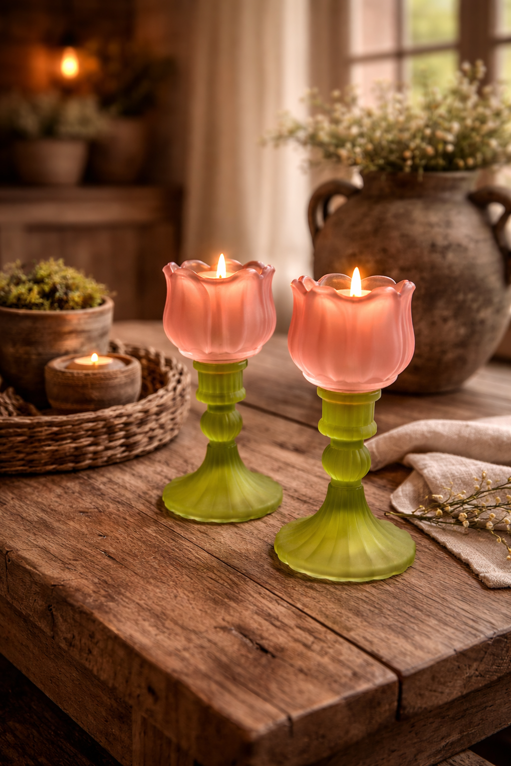 Set gekleurde waxinelichthouders in oranje