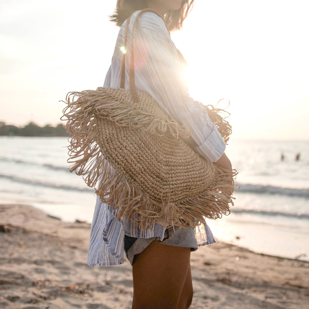 Beige schoudertas met franjes SUMBAWA
